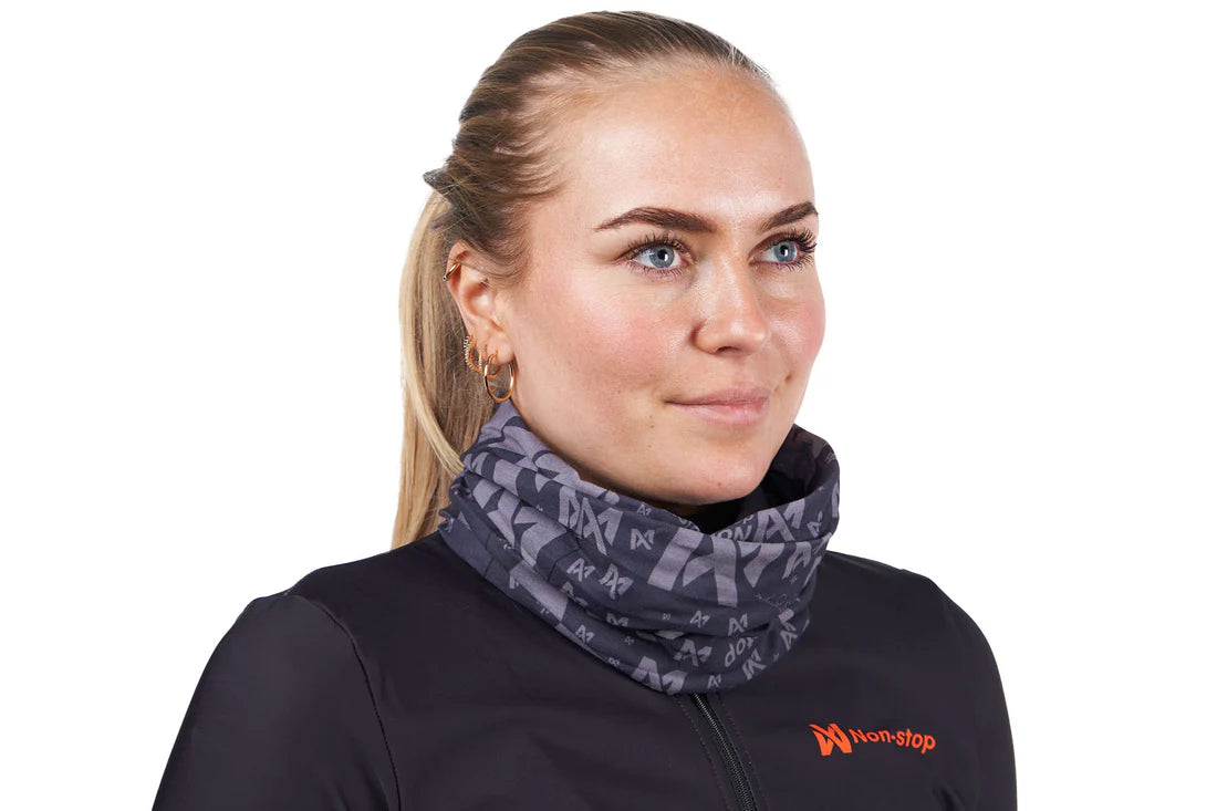 Multiscarf draped as a stylish headwrap, showcasing its versatile fabric and pattern.