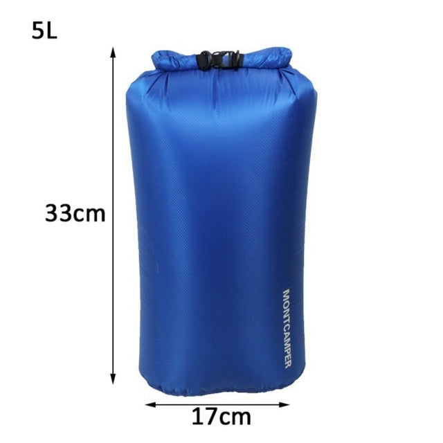Waterproof rafting kayak dry bag, blue, with securing straps.